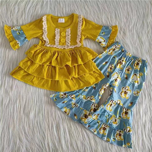 Yellow and blue boutique outfit with flowers on pants